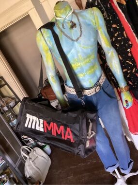 Title MMA Black  with white red letters